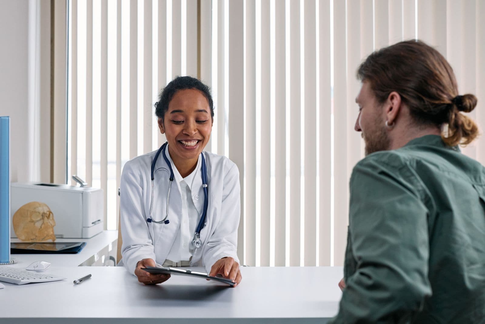 Medical practice SEO in Maryland: doctor talking to a patient